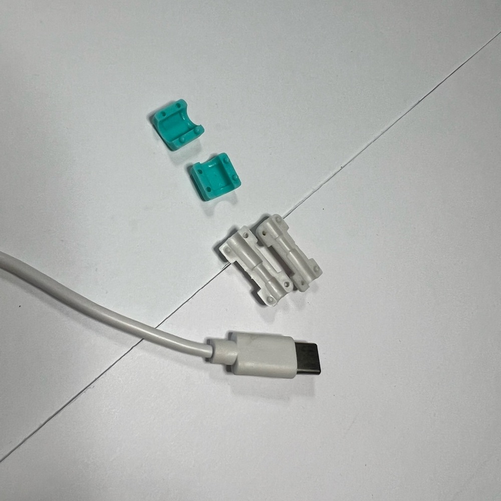Charger cord cover clips